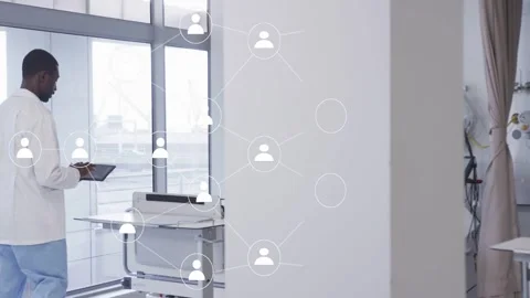Vertical video: Doctor raising tablet and gesturing, network nodes expanding Stock Footage 333368355
