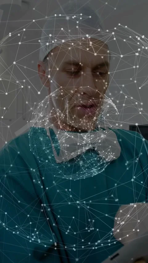 Vertical video: Doctor tapping tablet, reviewing patient data, showing AR node 動画素材 333912743