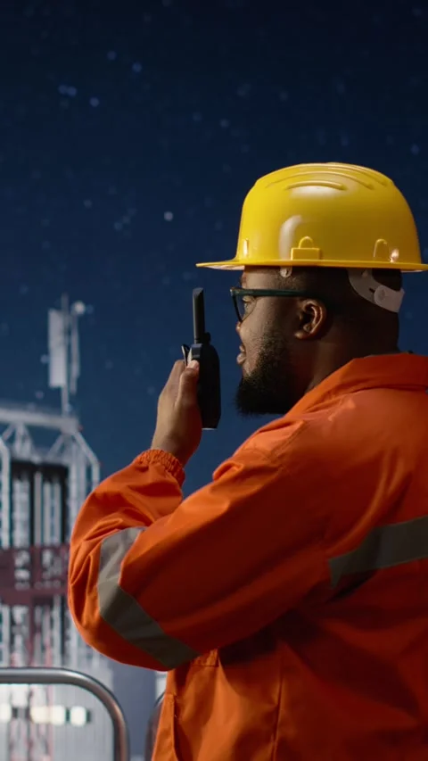 Vertical video Doing radio coordination, embargo and engineering team on Stock Footage 339889826