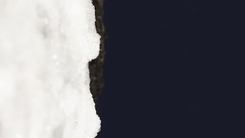 Vertical Video. Dolly. Time Lapse. Accelerated Melting of Snow on the Ground. Stock Footage 147324804