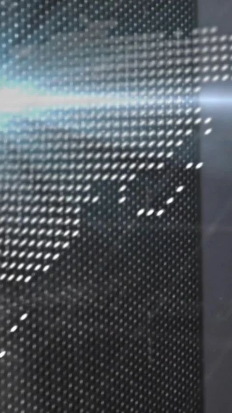 Vertical video: Dot grid shifting into map shapes as blue flare sweep causing Stock Footage 328350054