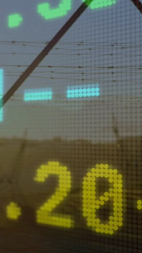 Vertical video: Dotted LED display updating from live energy feed, view Video stock 333835951
