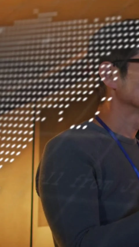 Vertical video: Dotted overlay shifting, fading, revealing man with lanyard and Stock Footage 334547042
