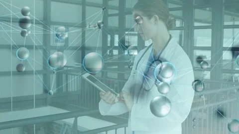 Vertical video: Dr tapping tablet, animating molecules over face, checking data, Stock Footage 332275890