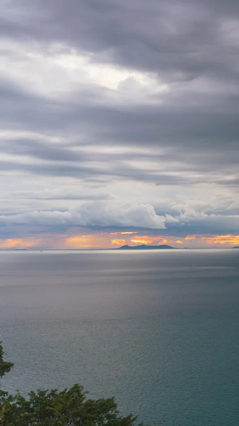 Vertical video. Dramatic Cloudy Sky over Calm Sea with Small Islands on Horizon Stock Footage 319278523