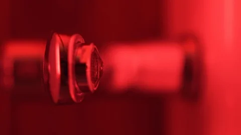 Vertical video of dripping tap. Red light, seamless Stock Footage 106437877