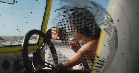 Vertical video: Driver checking mirror and applying lipstick before driving, AR Stock Footage 331701320