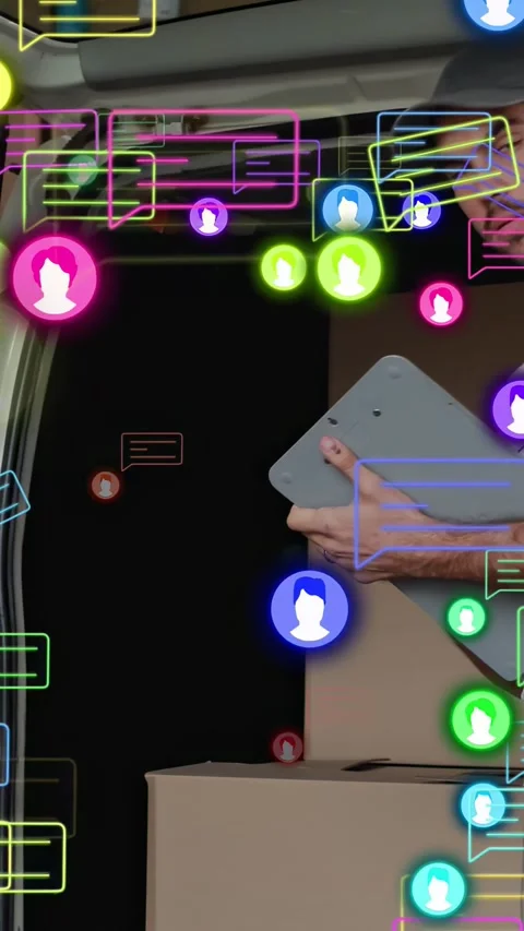 Vertical video: Driver getting pings over van, checking tablet scanning boxes Stock Footage 333135349