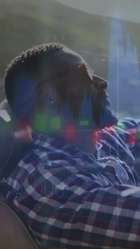 Vertical video: Driver settling in car for driving, car tech graphs pulsing Stock Footage 333821220