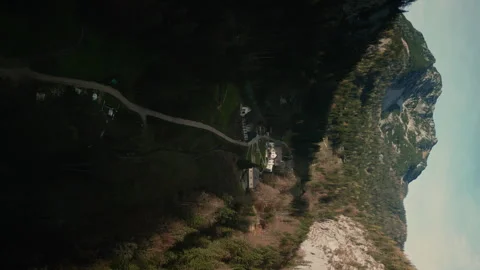Vertical Video. Drone Shot of Mountain Little Town Hallstatt in Heart of Europe Stock Footage 246495861