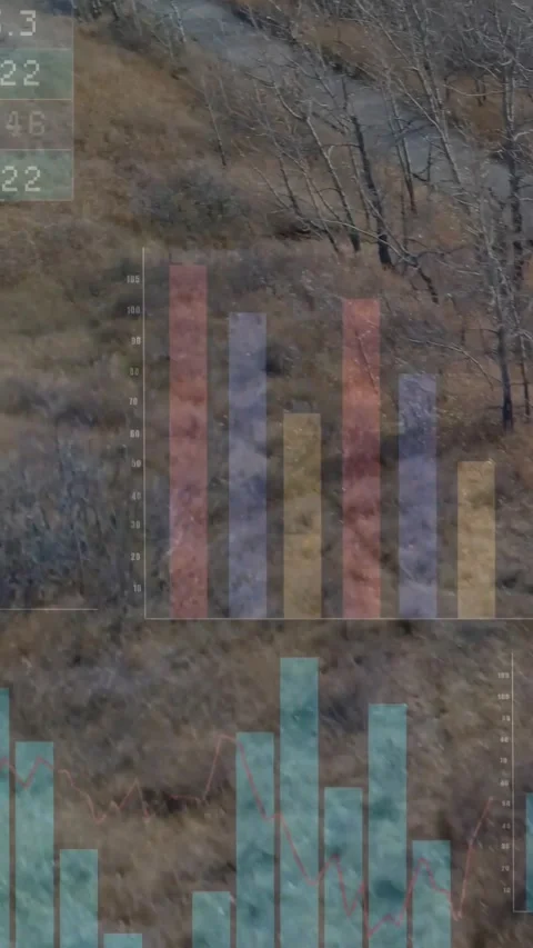 Vertical video: Drone view panning over hillside, causing bars, pies, matrix Stock Footage 328350170