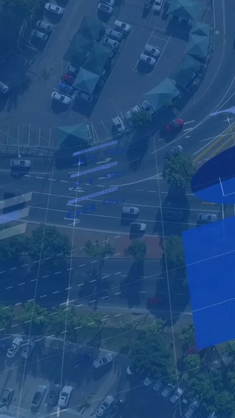 Vertical video: Drone view showing curved roadway loading data, displaying blue Stock Footage 331077415