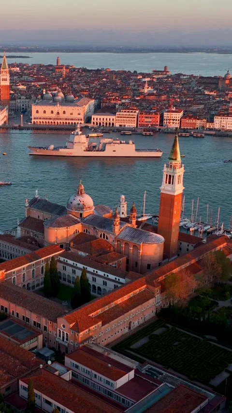 Vertical video, drone view of Venice at sunrise, aerial view of Island of San Video stock 291425676