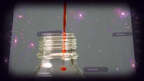 Vertical video: Dropping red drop above, glass neck forming filament on table, Stock Footage 334036517
