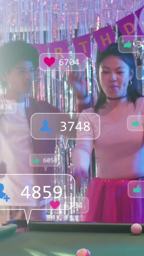 Vertical video: Duo dancing, playing pool at birthday; man starting stream, Stock Footage 333212573