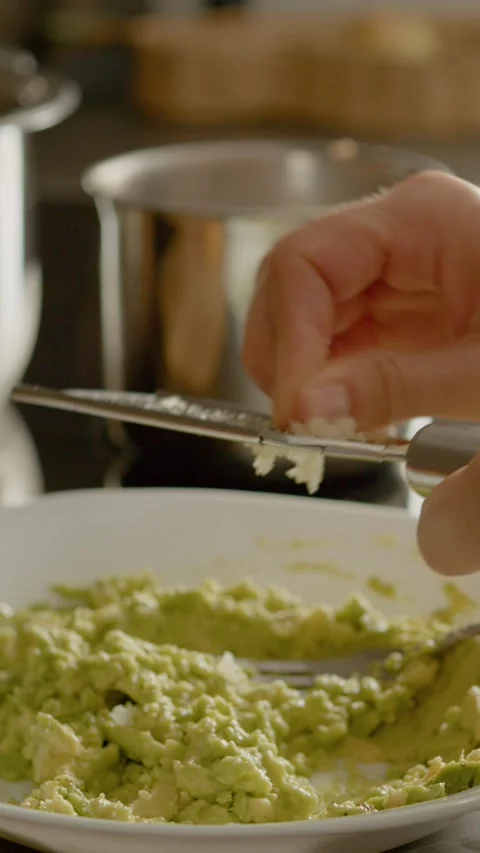 Vertical video Effective steaming of white drapery for smooth, wrinkle-free Stock Footage 327598180