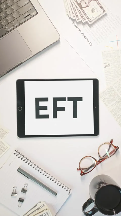 VERTICAL VIDEO OF EFT DISPLAYING ON A TABLET SCREEN Stock-Footage 308076710