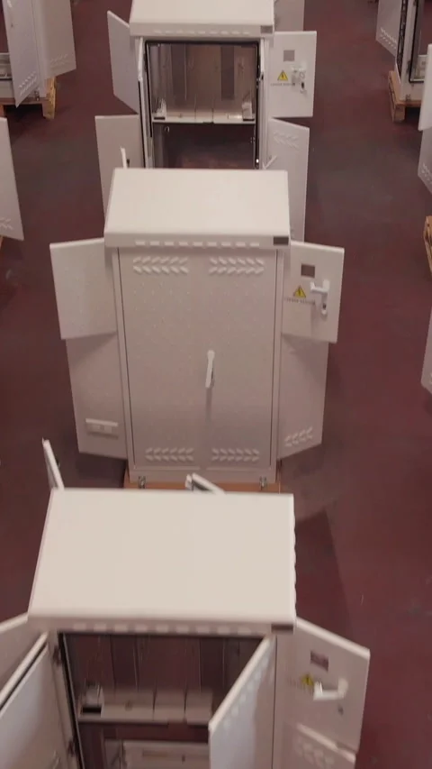 Vertical video Electrical panel production from the air Stockbeeldmateriaal 284977717