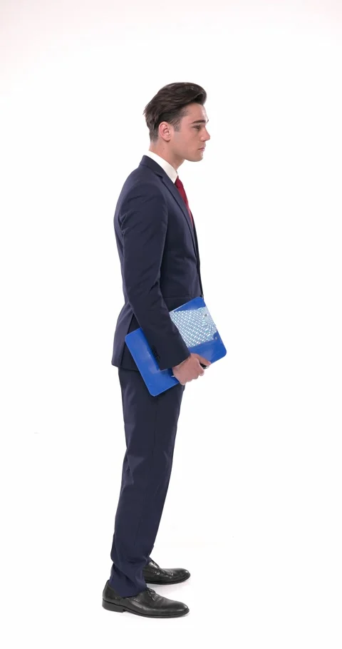 Vertical video of elegant young man in navy blue suit holding clipboard, Stock Footage 308383851