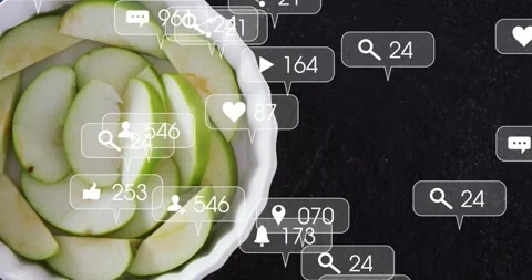 Vertical video: Emerging UI bubbles from right over dish of sliced apples in Stock Footage 331634762
