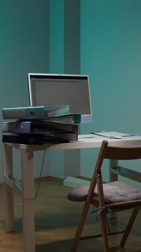 Vertical video employee carrying a stack of business folders and documents Stock Footage 344605688