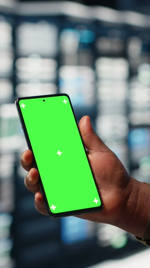 Vertical video Employee using app on mockup phone to check server hub energy Stock Footage 317055355