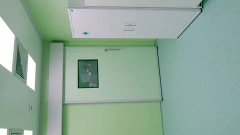 Vertical video. An empty corridor in front of the operating room. Stock-Footage 248906540