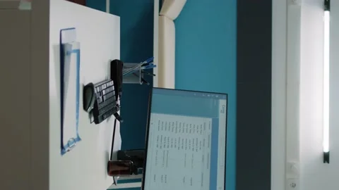 Vertical video: Empty doctors office with medical equipment and computer Stock Footage 171535693
