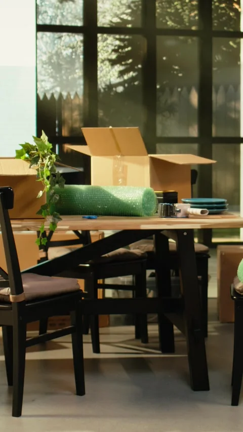 Vertical Video Empty new house interior with stacked cardboard boxes after Stock Footage 343348329