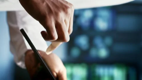 Vertical video Engineer in blockchain server room Stock Footage 246391576