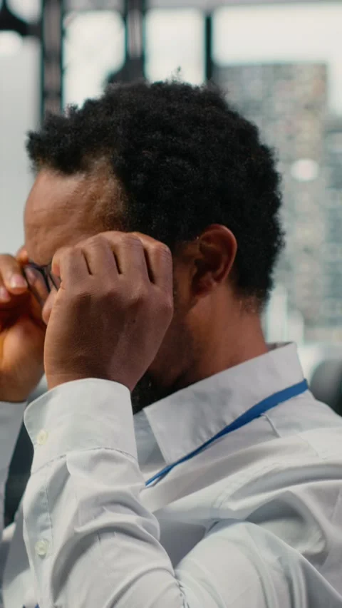 Vertical video Engineer chatting with manager in office, laughing while using AI Stock Footage 322695961