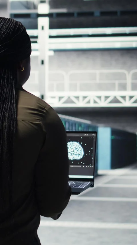 Vertical video Engineer doing data center automation using AI software tools on Stock Footage 316862608