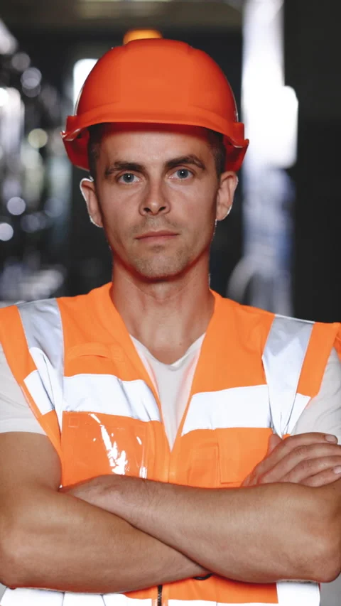 Vertical Video of an engineer man or worker crossing arms, working in electrical Stock Footage 304273452