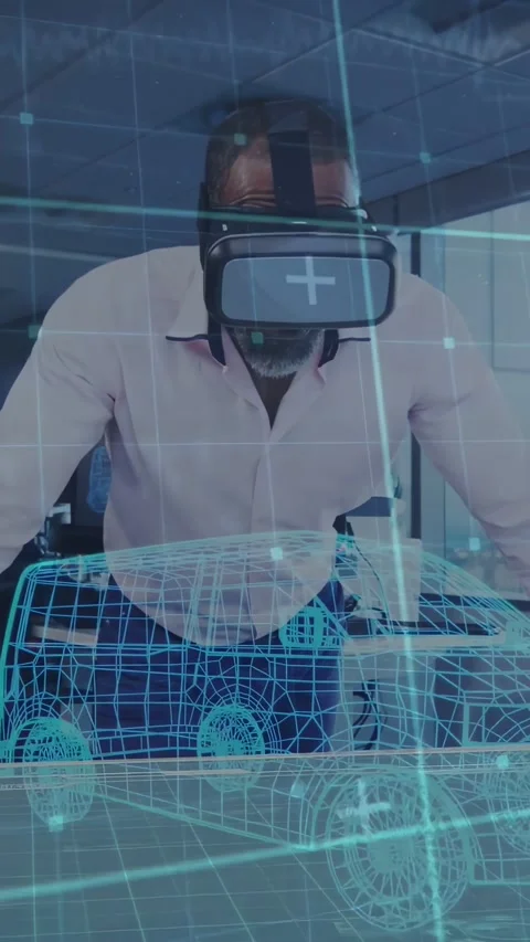 Vertical video: Engineer putting on VR headset, leaning and studying hologram Stock Footage 334187501