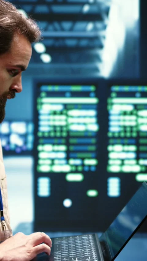 Vertical video Engineer servicing VPN servers Stock Footage 245917937