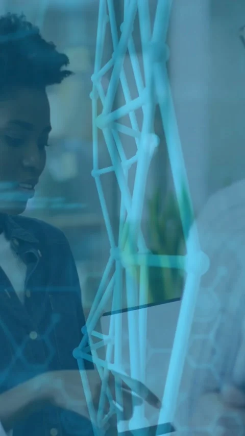 Vertical video: Engineer tapping tablet, gesturing to lattice, causing blue code Stock Footage 329961940