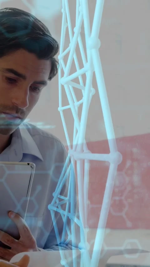 Vertical video: Engineer tilting tablet, rotating 3D lattice and scrolling code Stock Footage 332823816