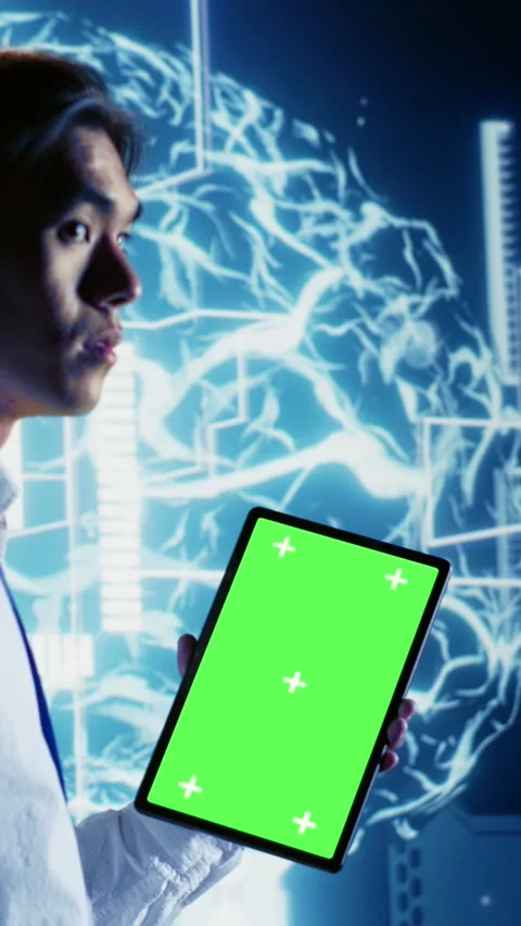 Vertical video Engineer uses chroma key tablet for AI Stock Footage 249078717