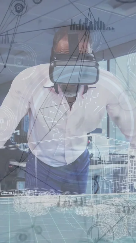 Vertical video: Engineer with VR positioning over desk, bracing hands, studying Stock Footage 332317379
