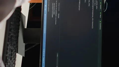 Vertical video Engineer writing code at home Stock Footage 254403328