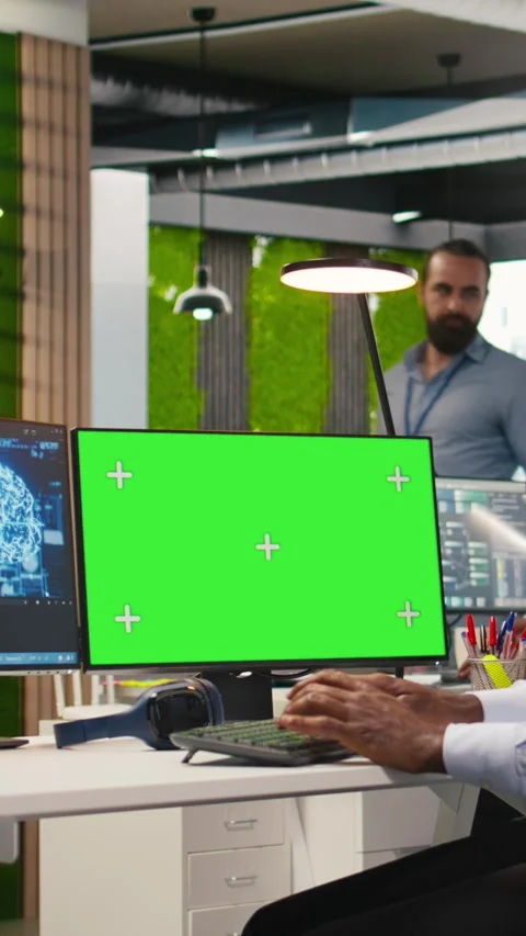 Vertical video Engineer writing code on green screen PC, developing machine Stock Footage 312709099