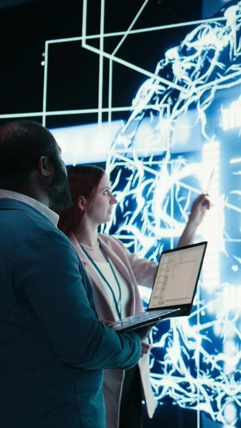 Vertical video Engineering team reporting to AI brain automated manager, solving Stock Footage 330086215