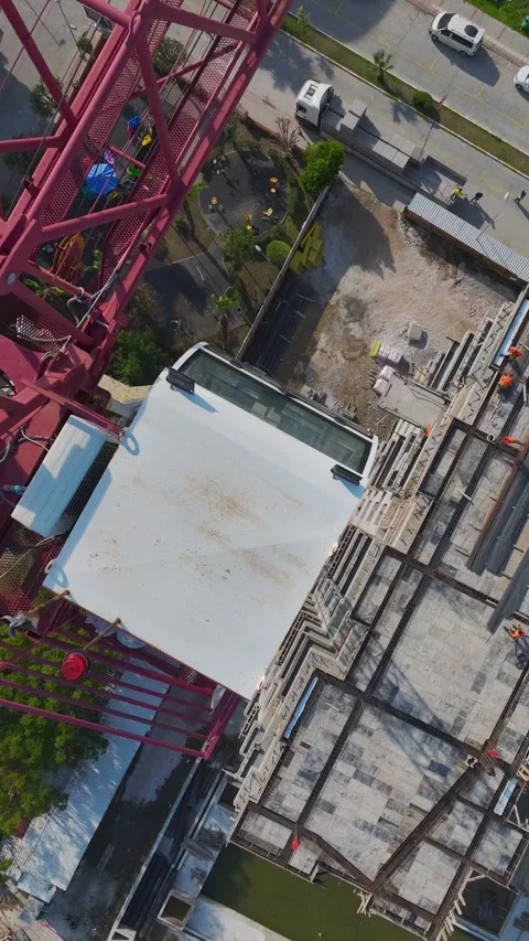 Vertical Video: Engineers Supervise Construction Teams Working With Metal and Stock Footage 342599433