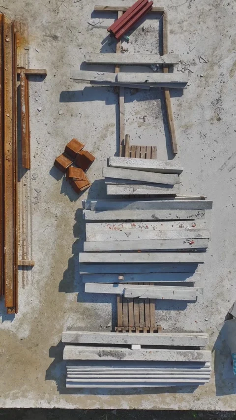 Vertical Video: Engineers Supervise Construction Teams Building Structural Walls Stock Footage 342603638