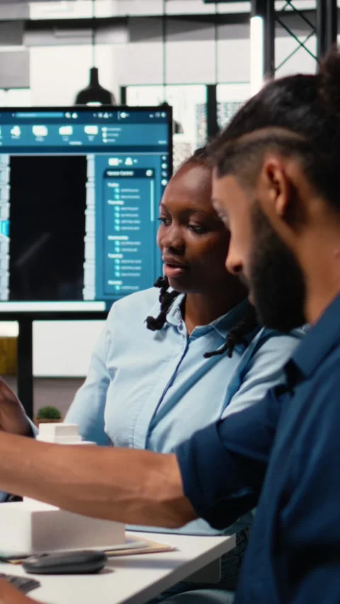 Vertical Video Engineers team using software for measurement and layout planning Stock Footage 316186074