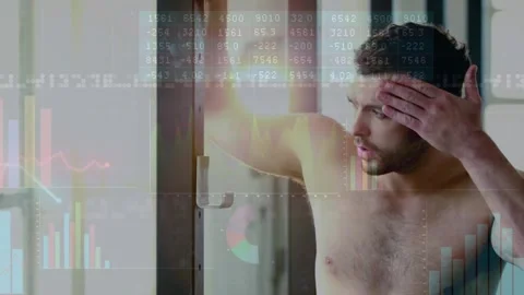 Vertical video: Entering shirtless man leaning on door in loft, wiping face from Stock Footage 330509451