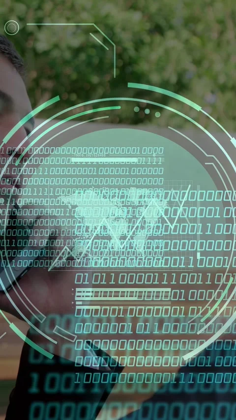 Vertical video: Exec answering phone, watching HUD growing binary and chart Stock Footage 337540935