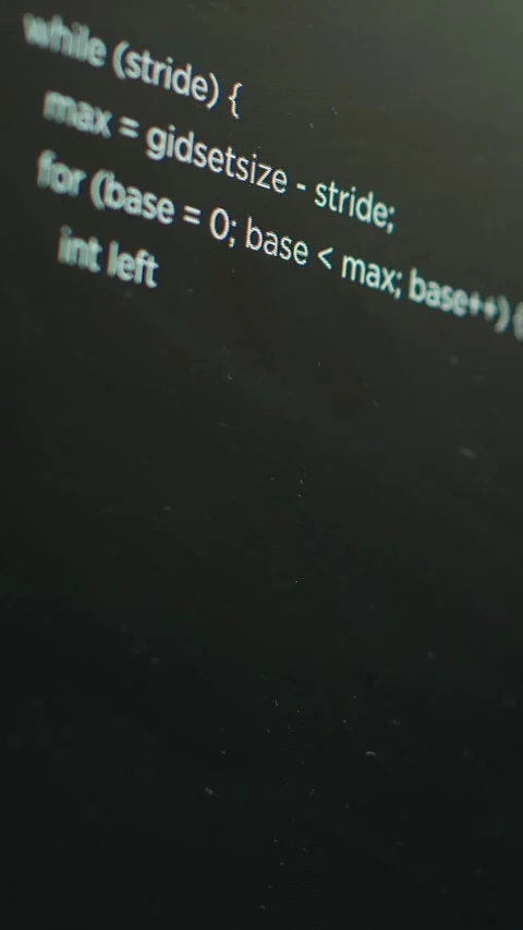 Vertical video Extreme close up shot of lines of code displayed on computer Video stock 275620328