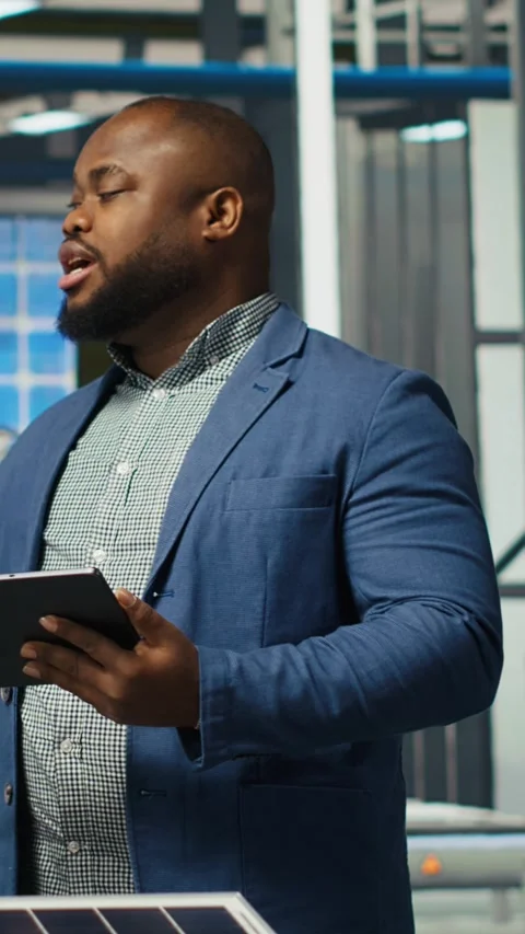 Vertical video Factory managers doing pitch in front of investors, showing Stock Footage 306055729