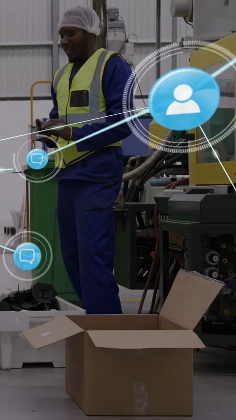Vertical video: Factory worker tapping phone, picking parts and showing network Stock Footage 331215847